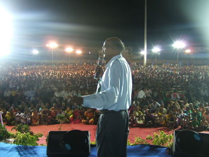 Christopher Premdas addressing a large community gathering
